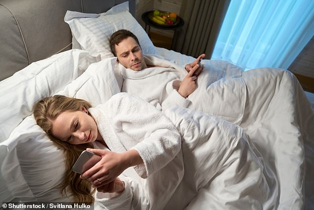 Is your spouse or partner always glued to their phone or computer?  Maybe work is crazy right now, or they are busy chatting with someone (stock image)