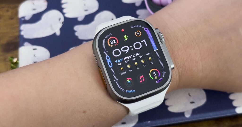 Close-up of person wearing Apple Watch Ultra 2 with watchOS 11